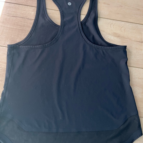 Lululemon tank, black with mesh on the bottom. Size 8 - Picture 2 of 2